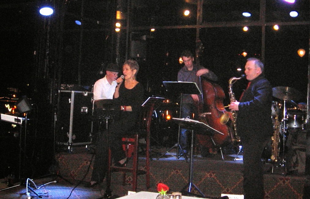 Audrey singing with her quartet on stage at the Terrace