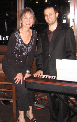 Audrey beside her pianist at the Balboa Cafe